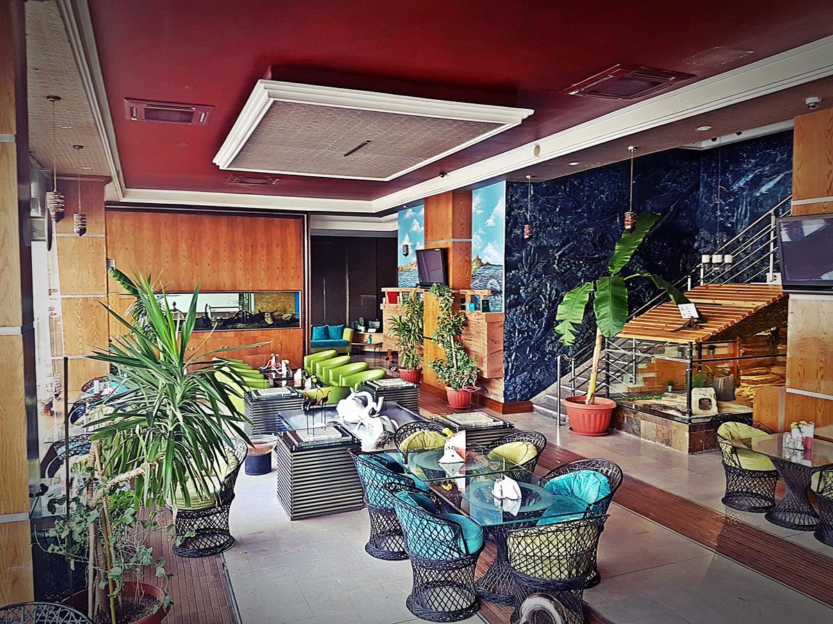 Aquarium Hotel Riaad Buitenkant foto